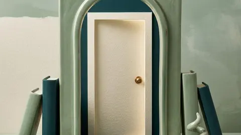 Two overlapping paper masks beside a shield and a closed envelope